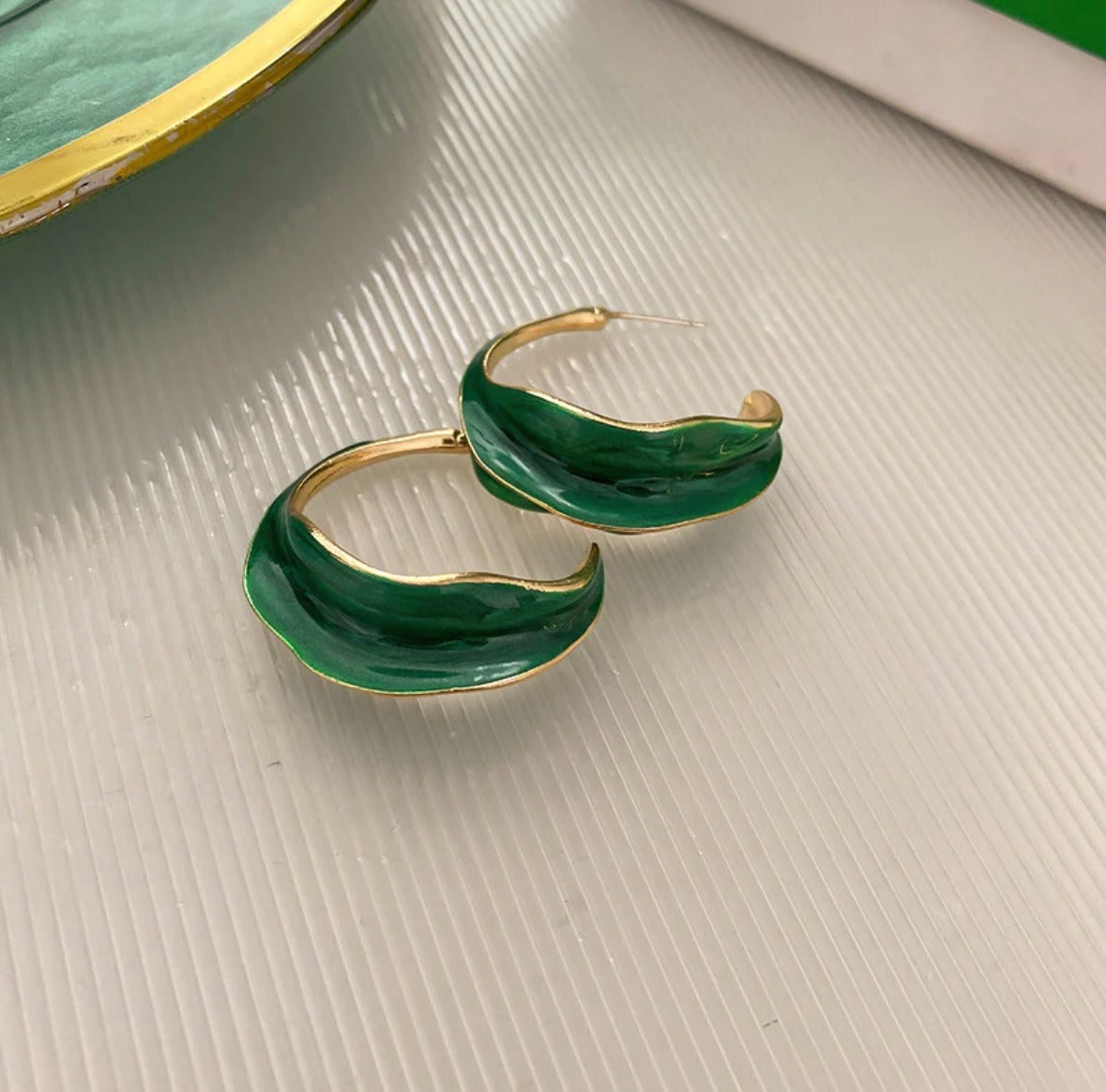 Green uneven enamel hoops