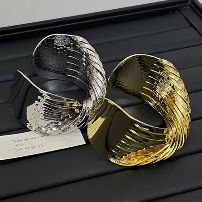 Exagerated Twisted Kada Bracelets