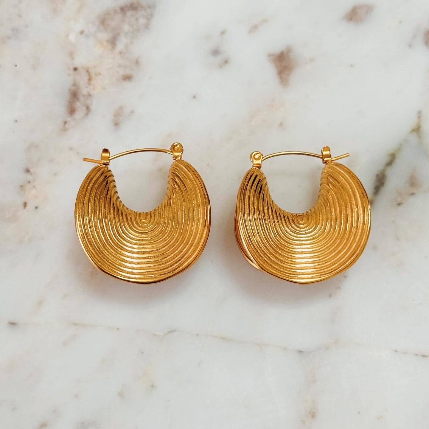 Curved Yet Hollow Hoops