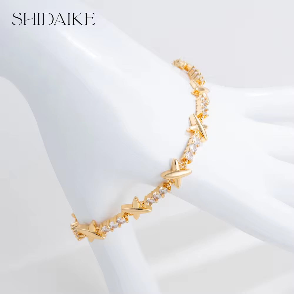 XOXO Tennis Gold SemiLuxe Bracelet