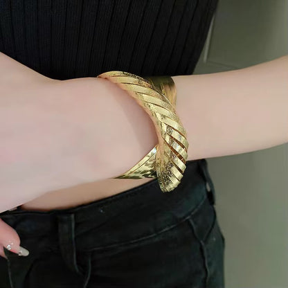 Exagerated Twisted Kada Bracelets